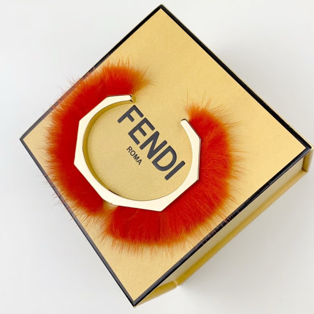 Fendi Monster Gold Cuff with Vibrant Orange Fur